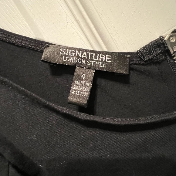 Dress with zip up back. Bottom of dress is a silk material. Size S. - Picture 3 of 3